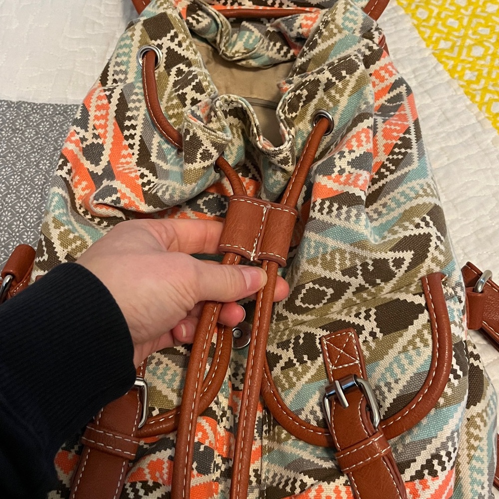 Patterned Backpack With Brown Accents - image 3